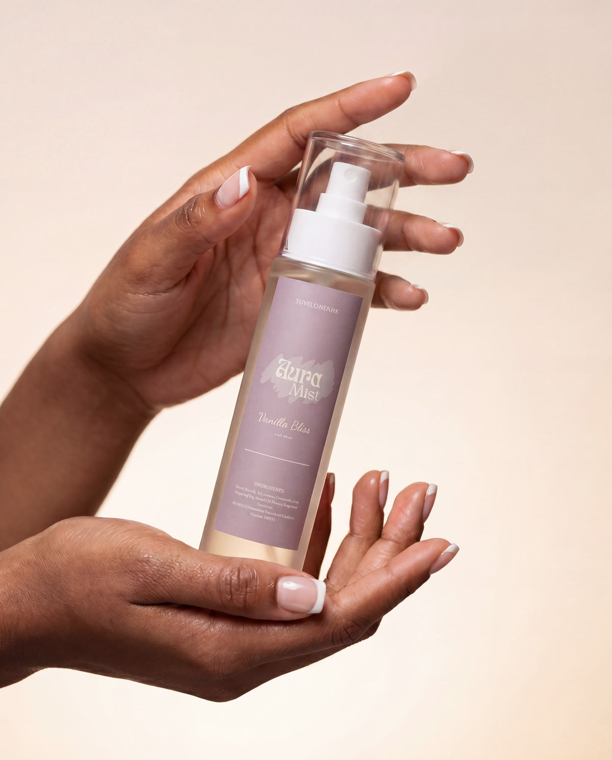 Hands holding a bottle of Sunflower Rx Aura Mist with mist spray visible, showcasing the product’s natural, refreshing appearance.